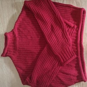 Red knitted turtleneck crop top sweater